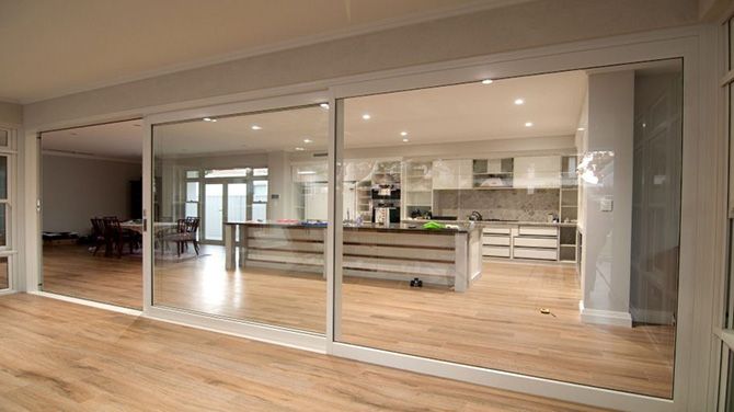 Know about the Pros and Cons of Installing Residential Automatic Doors